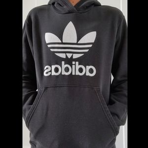 A black Adidas hoodie